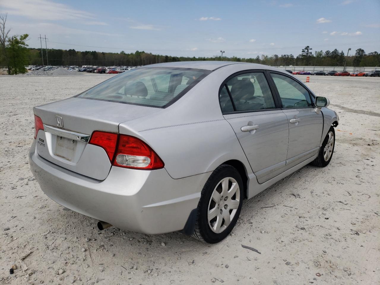Photo 4 from auction – 2011 HONDA CIVIC LX with VIN 2HGFA1F57BH503377