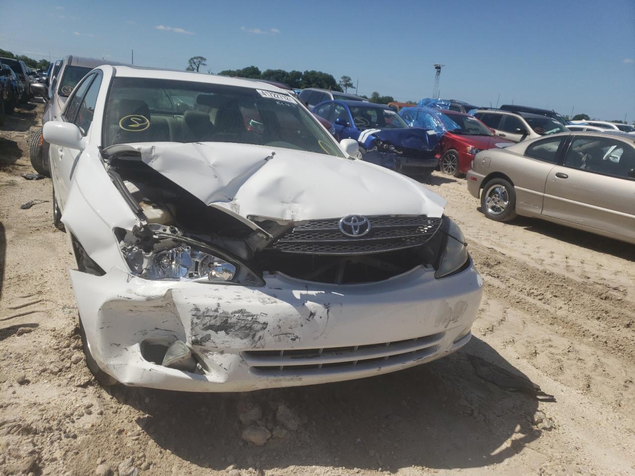 Photo 9 from auction – 2004 TOYOTA CAMRY LE with VIN 4T1BE32KX4U298741