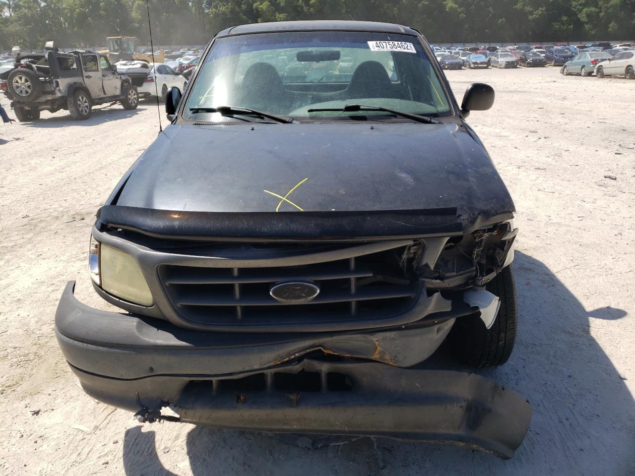 Photo 9 from auction – 2003 FORD F150 with VIN 1FTRF17293NB49629