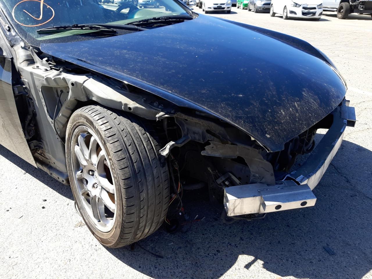 Photo 9 from auction – 2004 INFINITI G35 with VIN JNKCV54E84M305292