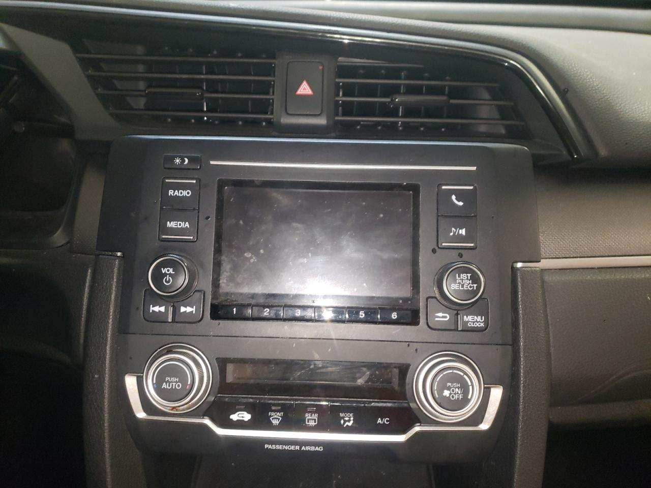 Photo 9 from auction – 2016 HONDA CIVIC LX with VIN 2HGFC2F54GH575211