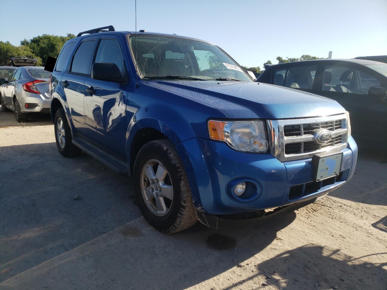 FORD ESCAPE XLT 2011 with VIN 1FMCU9DGXBKA68323 - Photo from auction