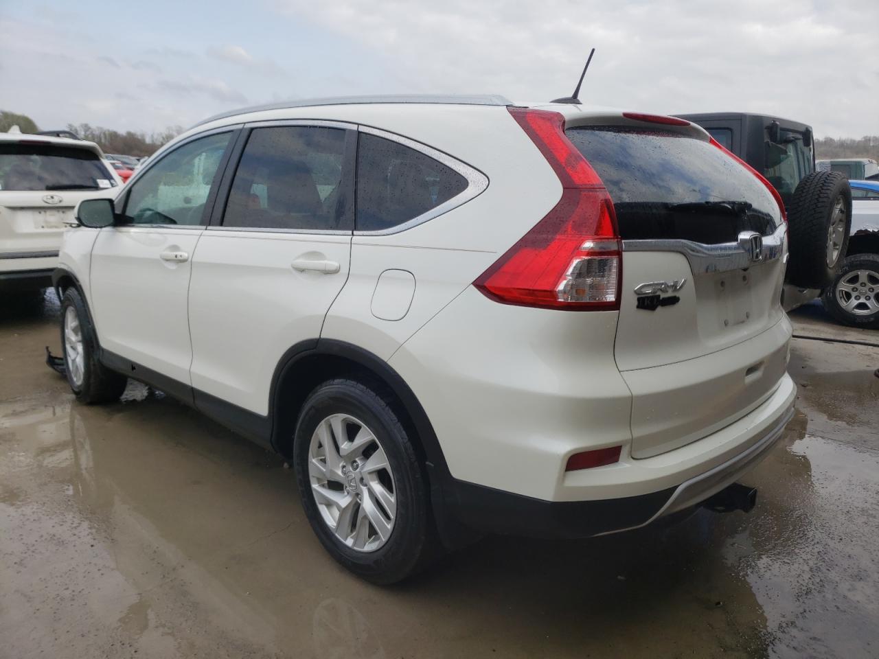 Photo 3 from auction – 2016 HONDA CR-V EXL with VIN 5J6RM4H70GL016092