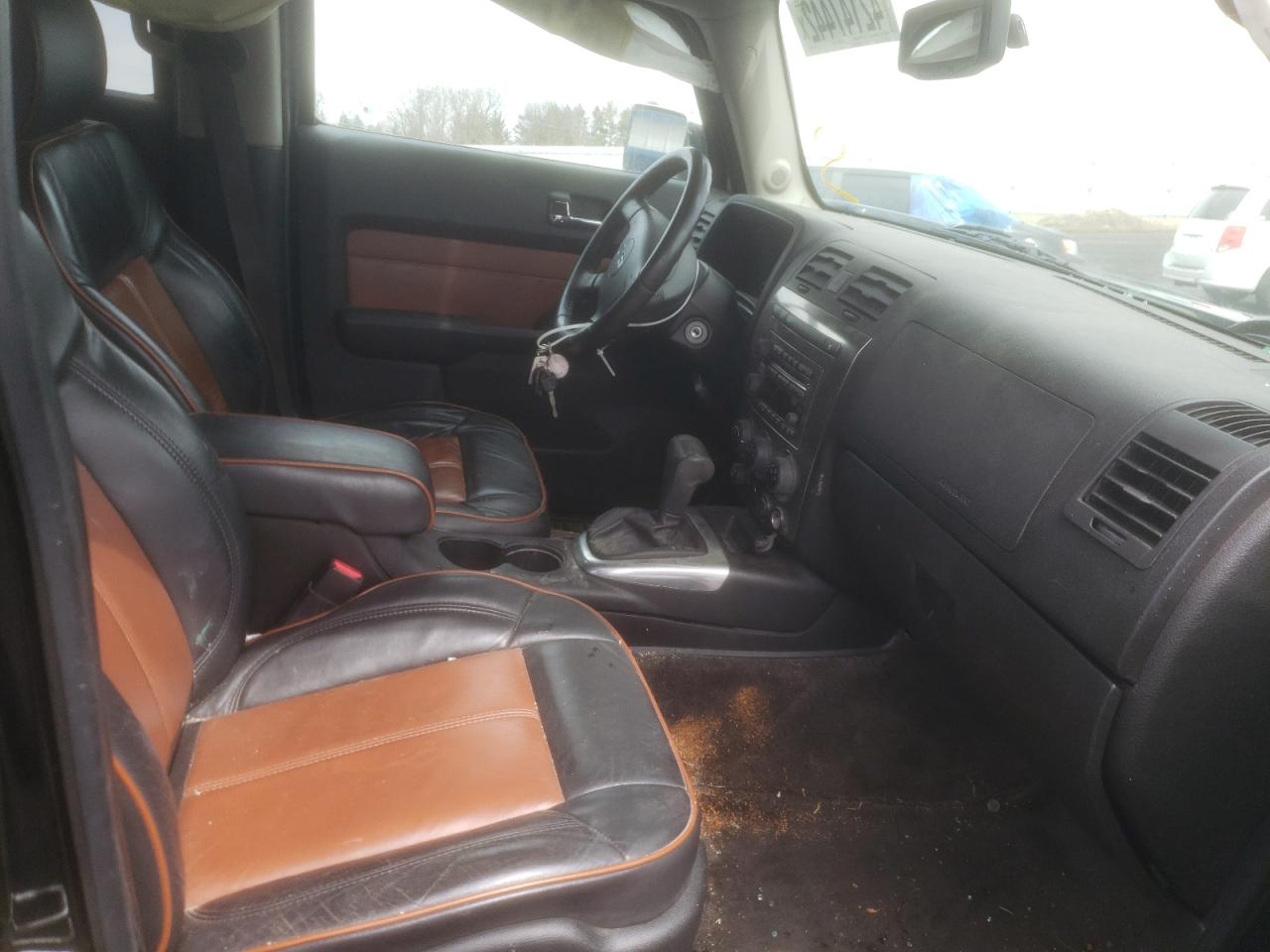 Photo 5 from auction – 2009 HUMMER H3 with VIN 5GTEN13E898113898