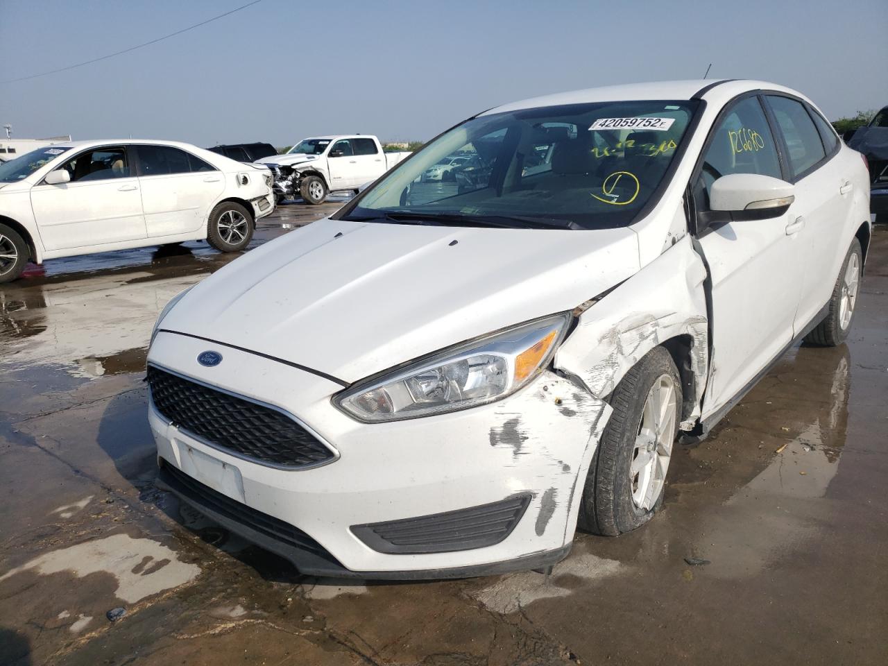 Photo 2 from auction – 2017 FORD FOCUS SE with VIN 1FADP3F28HL204553