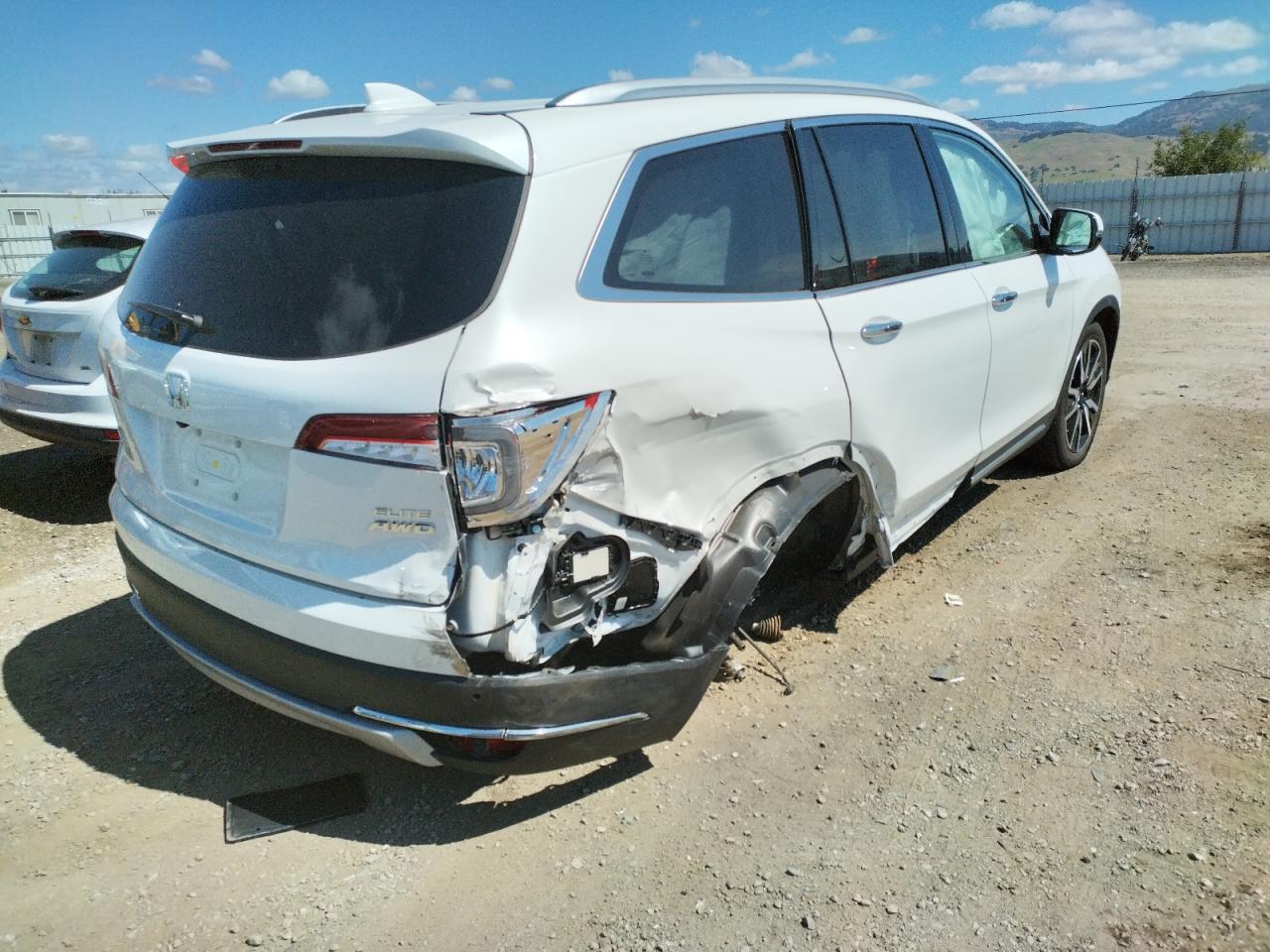 Photo 4 from auction – 2020 HONDA PILOT ELIT with VIN 5FNYF6H0XLB003678