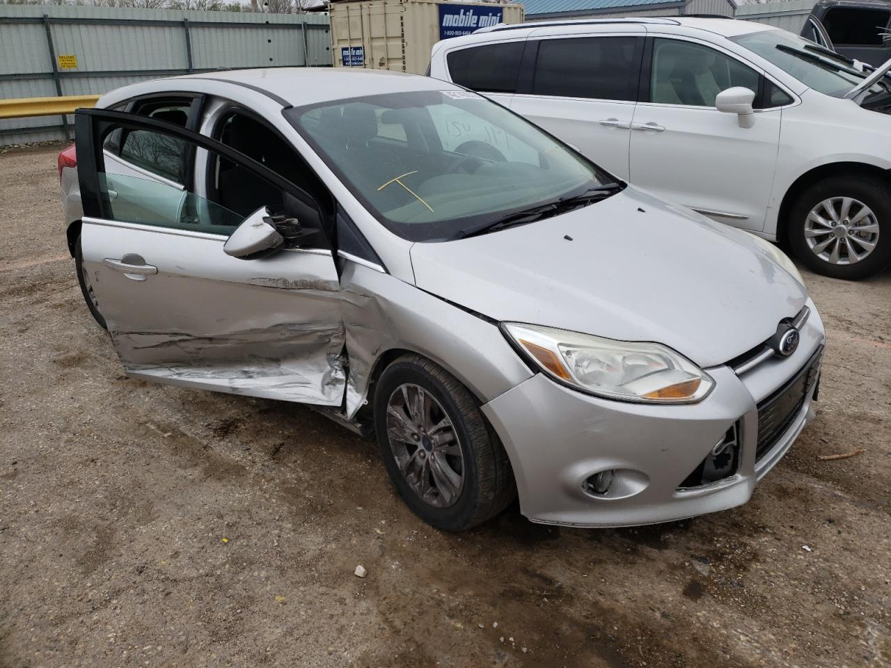 FORD FOCUS SEL 2012 with VIN 1FAHP3M22CL357667 - Photo from auction