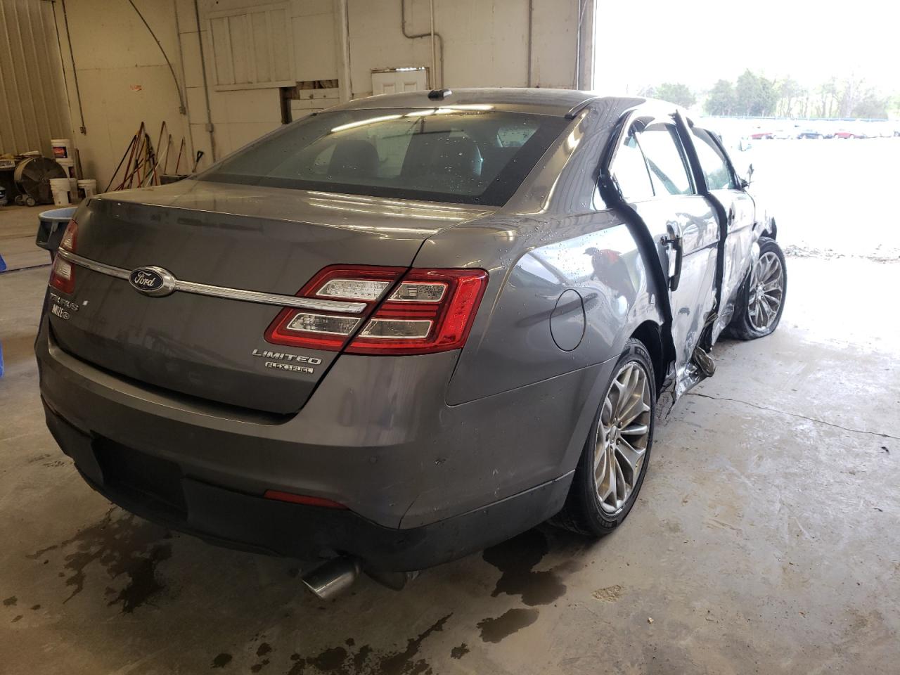 Photo 4 from auction – 2014 FORD TAURUS LIM with VIN 1FAHP2F86EG179799