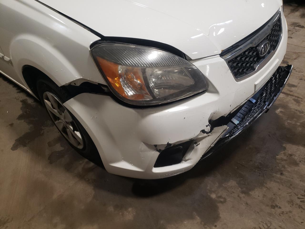 Photo 9 from auction – 2011 KIA RIO BASE with VIN KNADH4A34B6753490