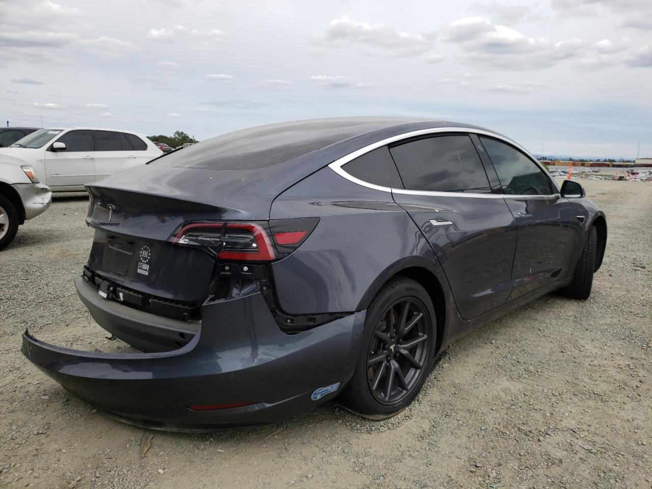 Photo 4 from auction – 2018 TESLA MODEL 3 with VIN 5YJ3E1EA2JF025894