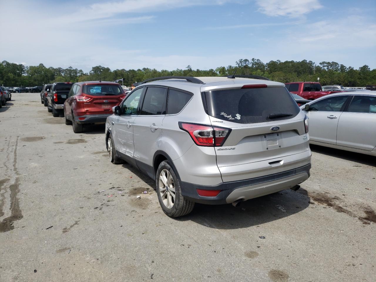 Photo 3 from auction – 2017 FORD ESCAPE SE with VIN 1FMCU9GD4HUD14278