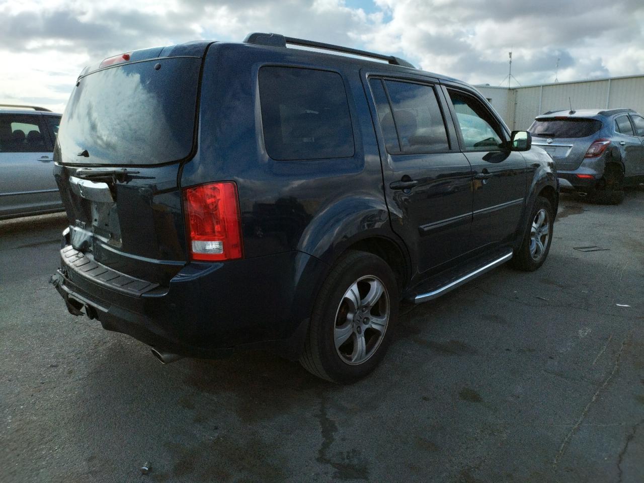 Photo 4 from auction – 2012 HONDA PILOT EXLN with VIN 5FNYF3H73CB029020
