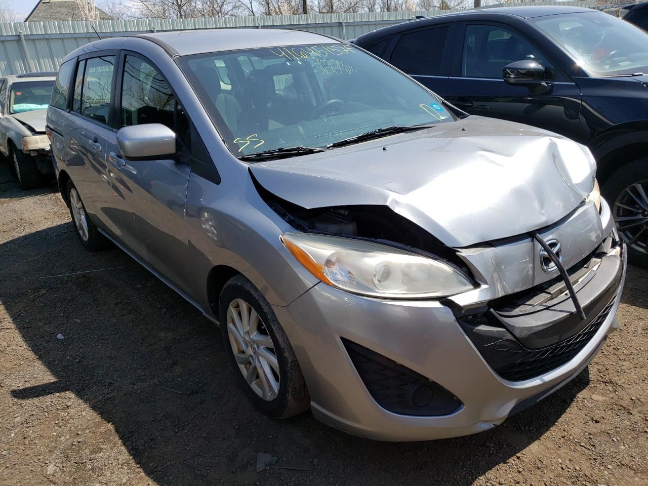 MAZDA 5 2012 with VIN JM1CW2BL9C0144584 - Photo from auction