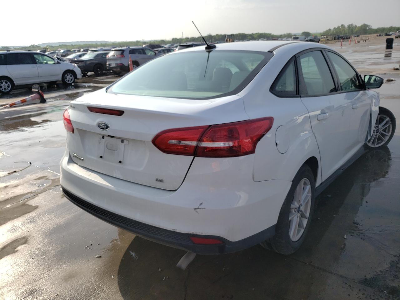 Photo 4 from auction – 2017 FORD FOCUS SE with VIN 1FADP3F28HL204553