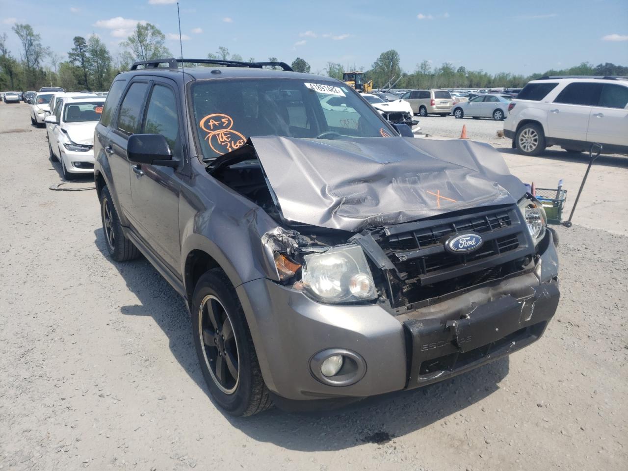 FORD ESCAPE XLT 2011 with VIN 1FMCU0DG8BKA78733 - Photo from auction