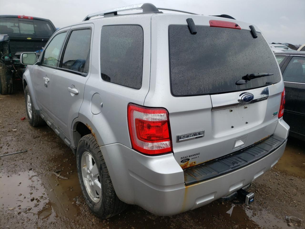 Photo 3 from auction – 2011 FORD ESCAPE LIM with VIN 1FMCU9EG2BKB44549