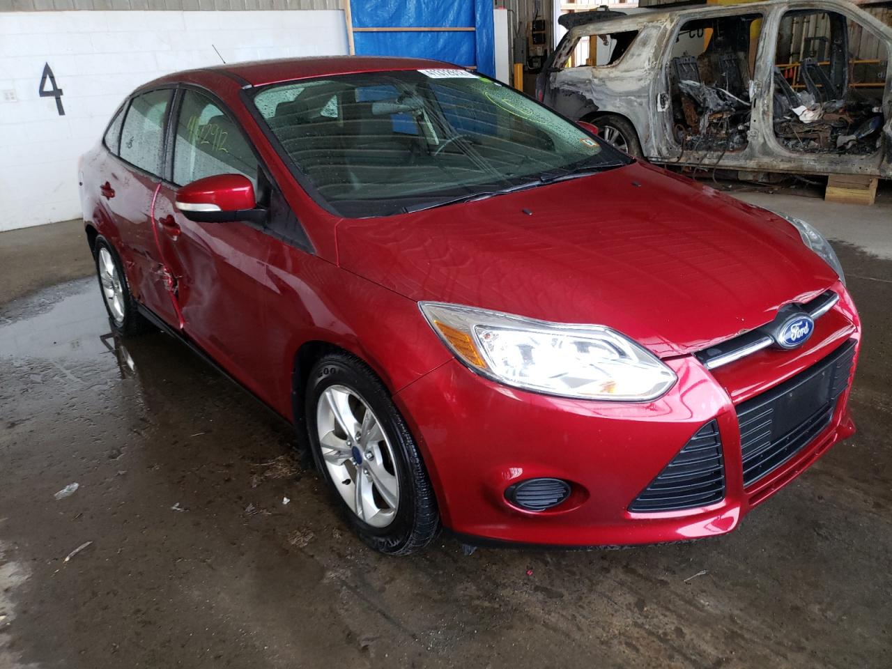 FORD FOCUS SE 2014 with VIN 1FADP3F23EL151935 - Photo from auction