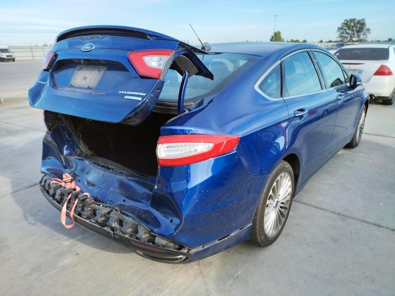 Photo 4 from auction – 2016 FORD FUSION TIT with VIN 3FA6P0K94GR344397
