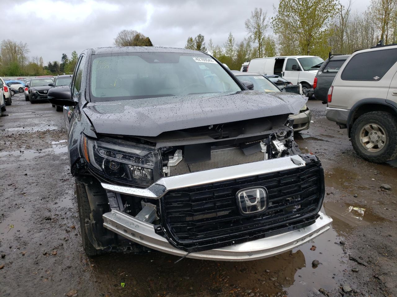 Photo 9 from auction – 2021 HONDA RIDGELINE with VIN 5FPYK3F76MB023123