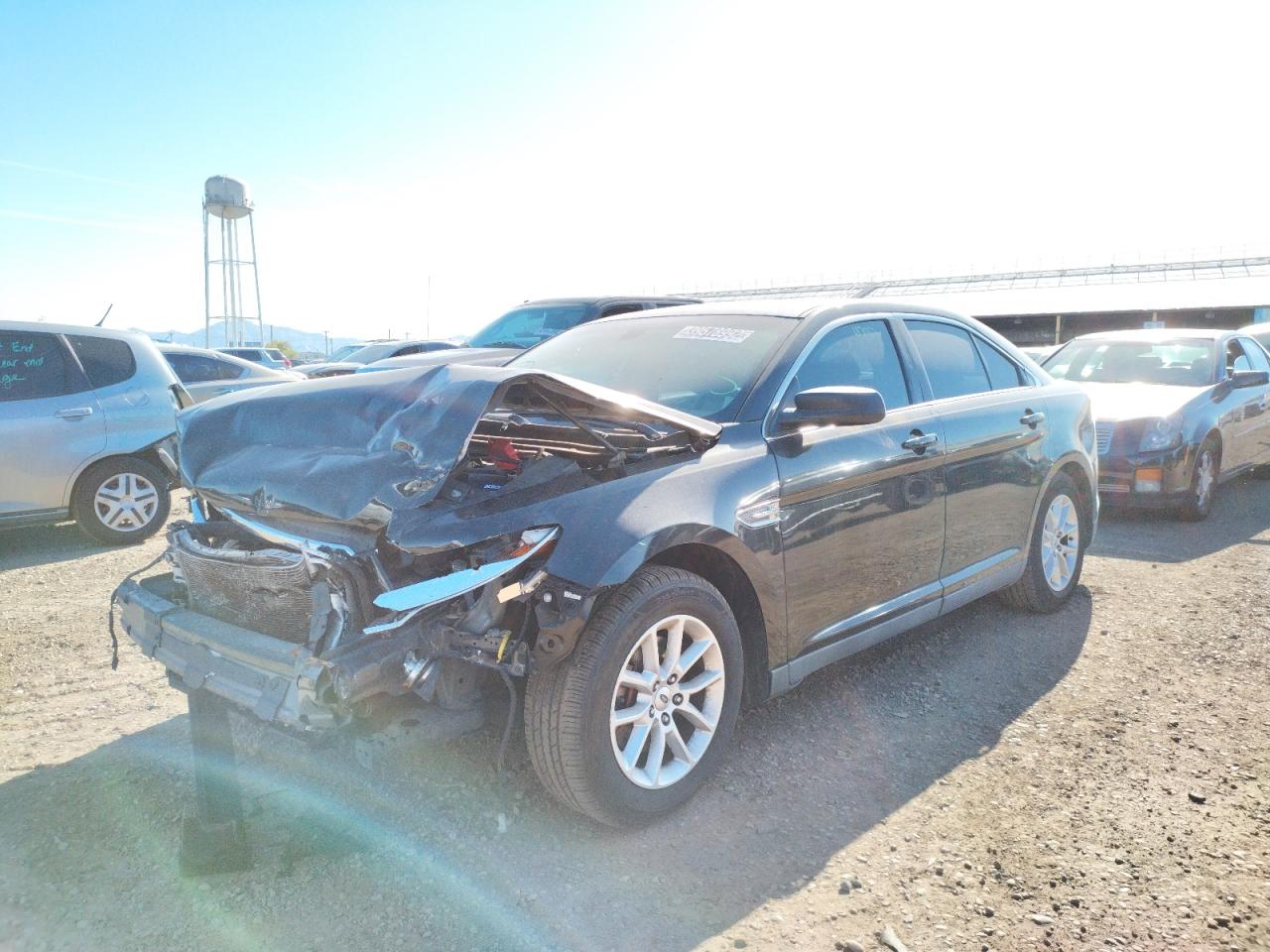 Photo 2 from auction – 2014 FORD TAURUS SE with VIN 1FAHP2D8XEG119723