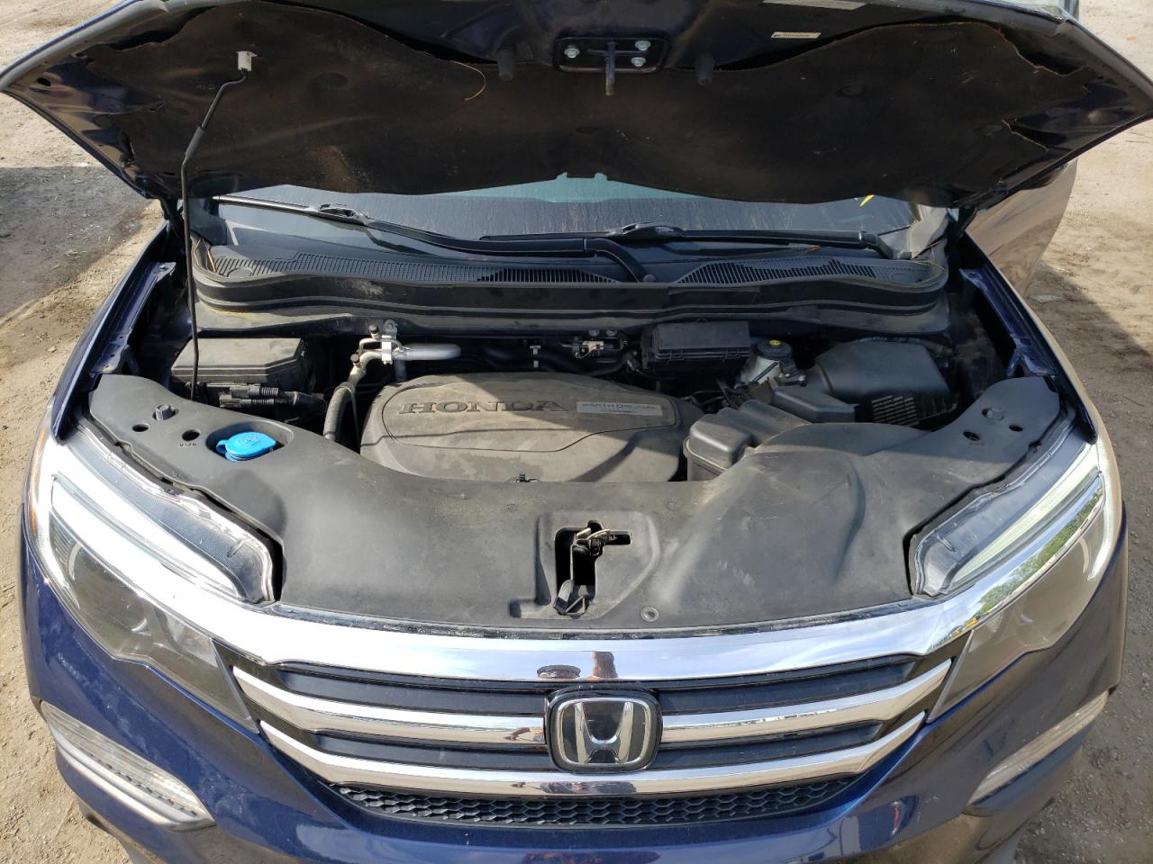 Photo 7 from auction – 2016 HONDA PILOT with VIN 5FNYF5H9XGB047887
