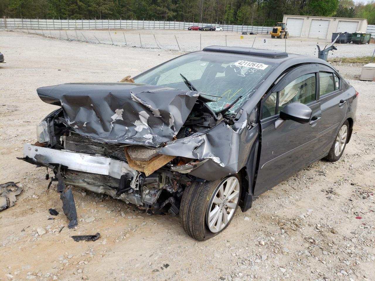 Photo 2 from auction – 2012 HONDA CIVIC EXL with VIN 2HGFB2F94CH513811