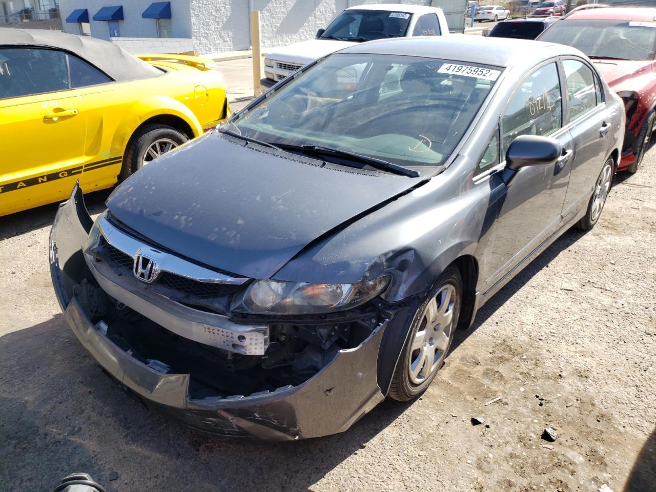 Photo 2 from auction – 2011 HONDA CIVIC LX with VIN 19XFA1F50BE012899