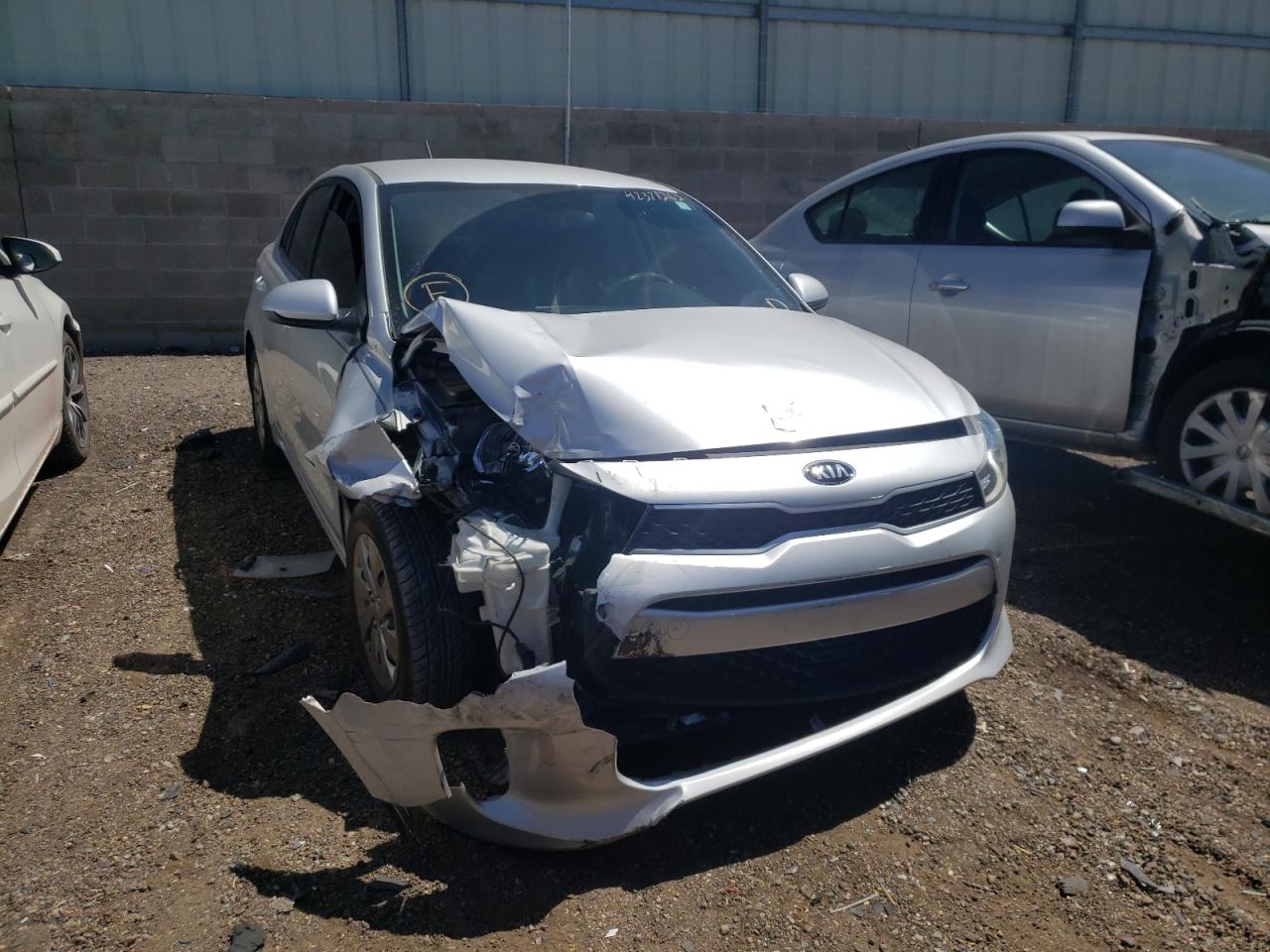 KIA RIO LX 2018 with VIN 3KPA24AB9JE061104 - Photo from auction