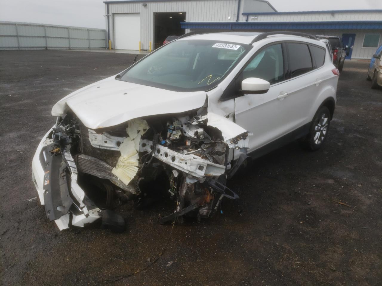 Photo 2 from auction – 2014 FORD ESCAPE SE with VIN 1FMCU9G95EUD60273