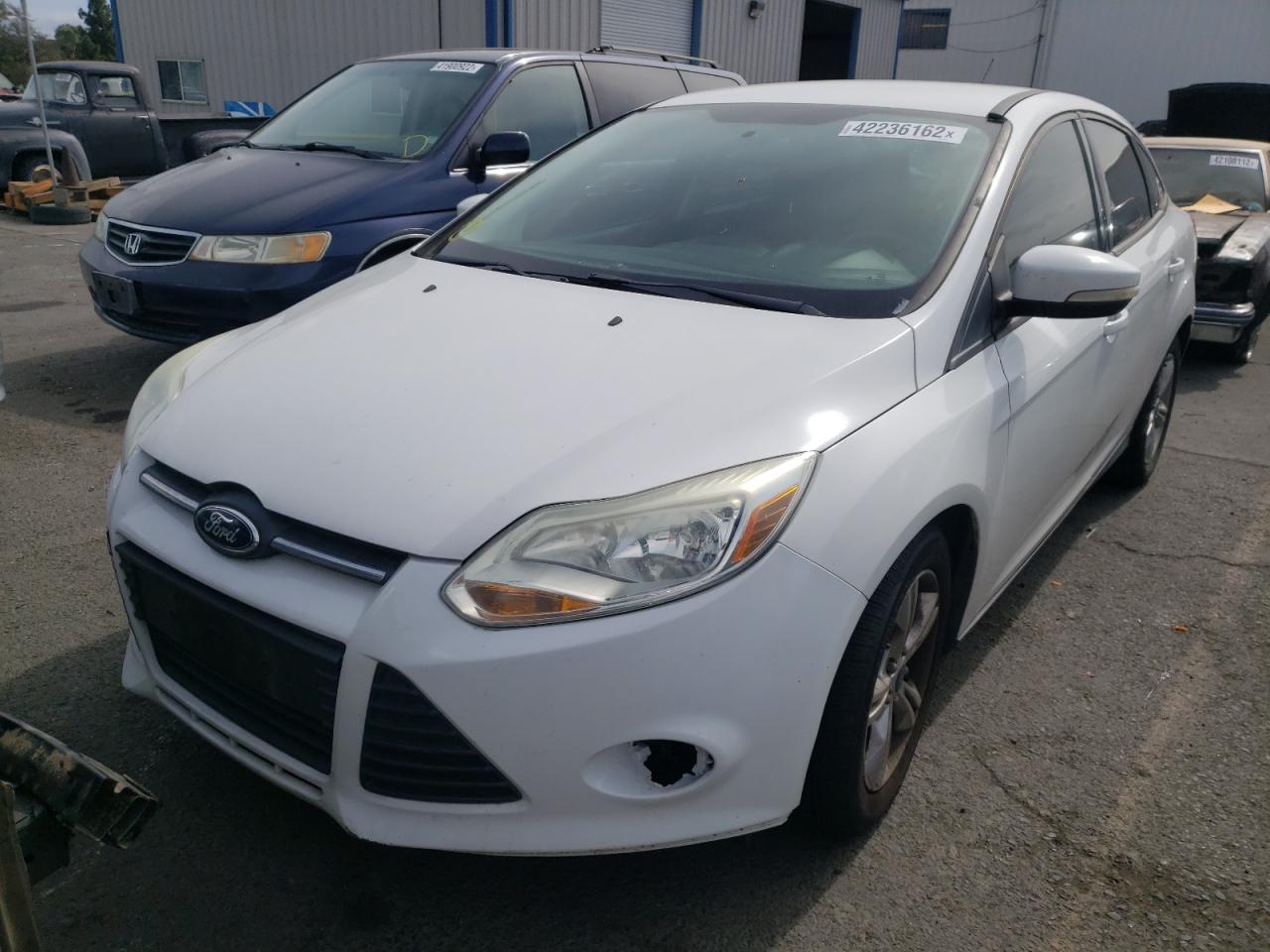 Photo 2 from auction – 2013 FORD FOCUS SE with VIN 1FADP3F27DL213173