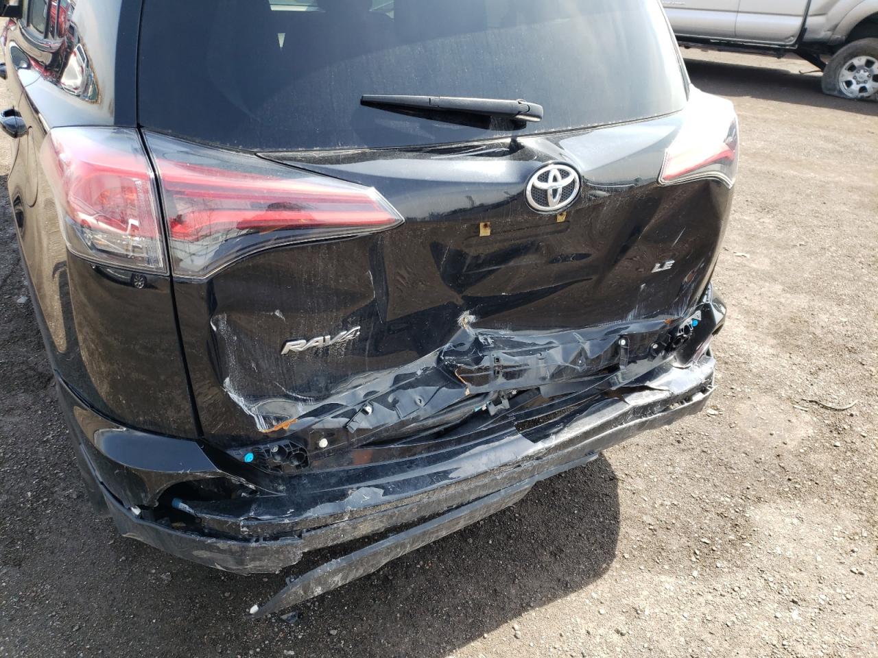 Photo 9 from auction – 2018 TOYOTA RAV4 LE with VIN 2T3ZFREV9JW497562