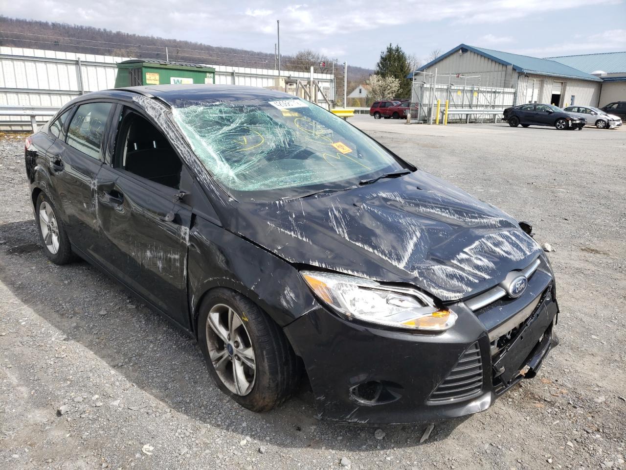 FORD FOCUS SE 2014 with VIN 1FADP3F24EL243359 - Photo from auction