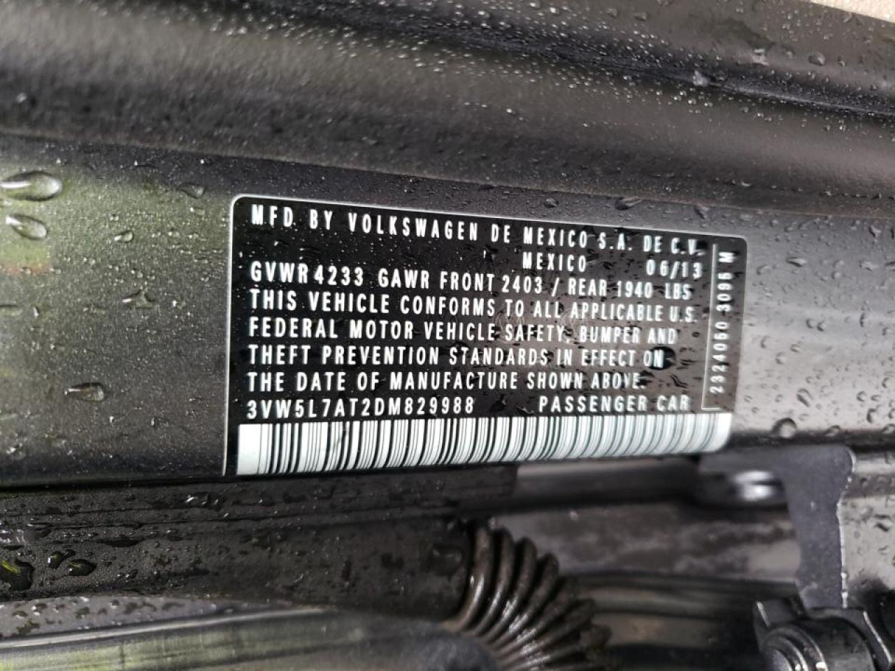 Photo 10 from auction – 2013 VOLKSWAGEN BEETLE with VIN 3VW5L7AT2DM829988