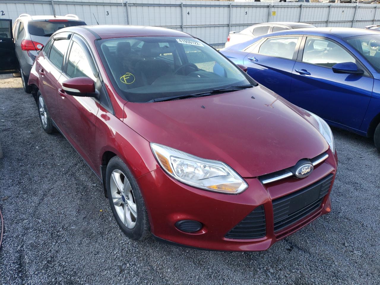 FORD FOCUS SE 2014 with VIN 1FADP3F22EL359269 - Photo from auction