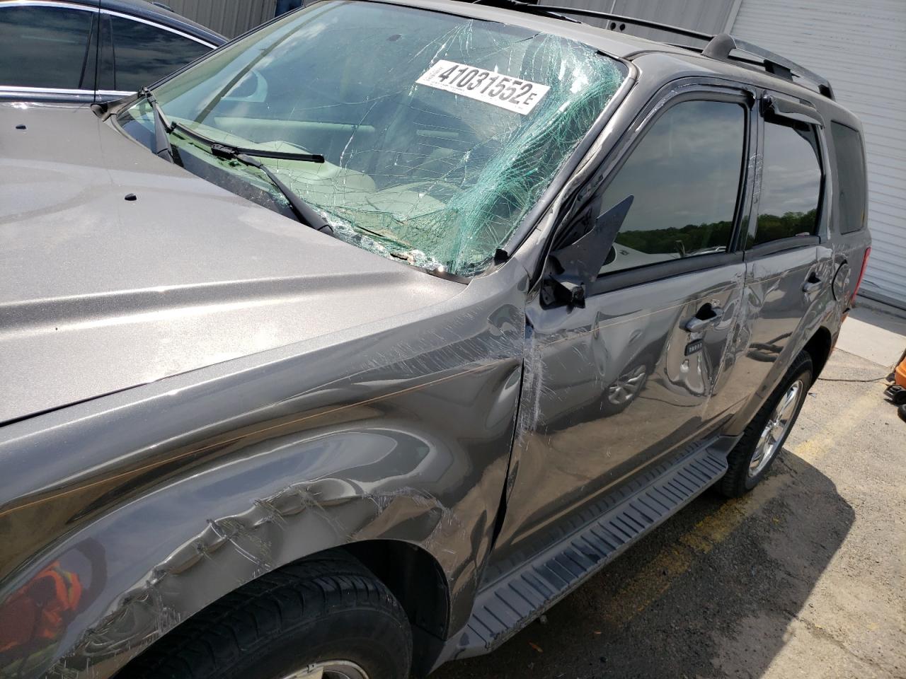 Photo 10 from auction – 2009 FORD ESCAPE LIM with VIN 1FMCU04G99KC04592