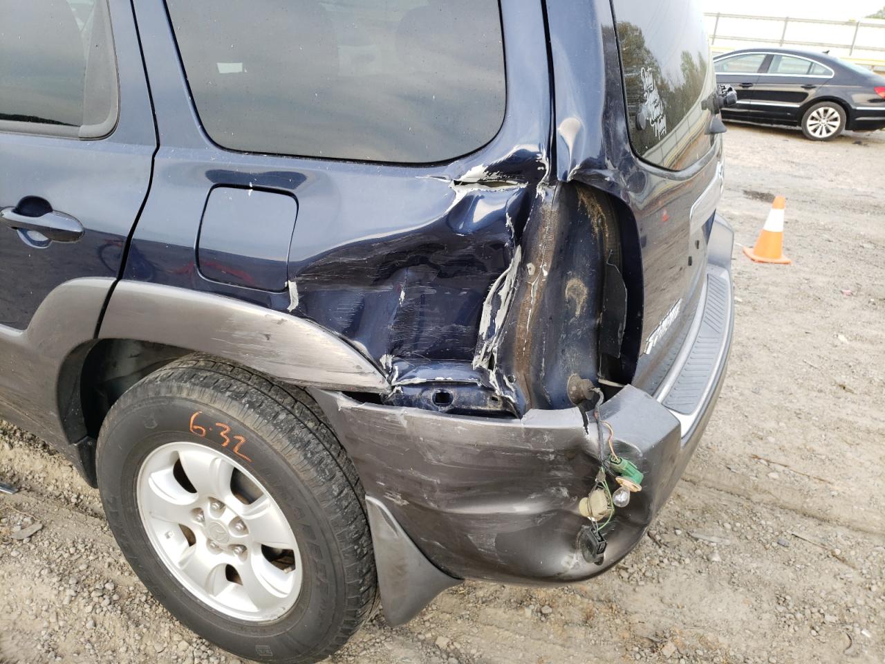 Photo 9 from auction – 2004 MAZDA TRIBUTE with VIN 4F2YZ94174KM27377