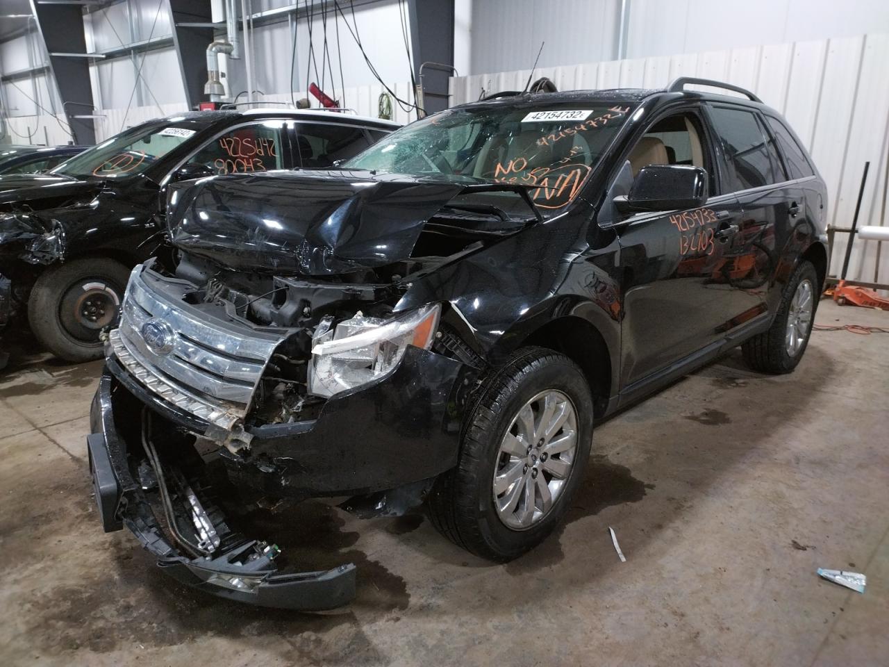 Photo 2 from auction – 2009 FORD EDGE LIMIT with VIN 2FMDK39CX9BB05646