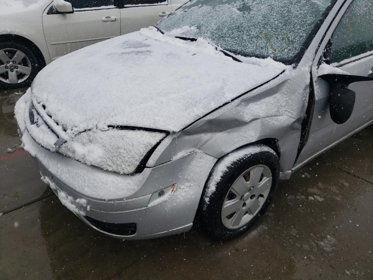 Photo 9 from auction – 2007 FORD FOCUS ZX4 with VIN 1FAFP34N37W311075