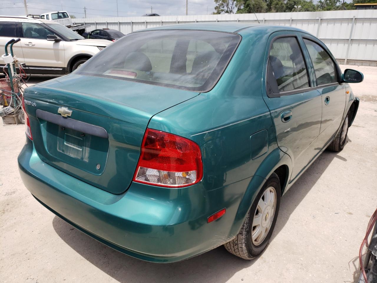 Photo 4 from auction – 2004 CHEVROLET AVEO with VIN KL1TJ52694B192402