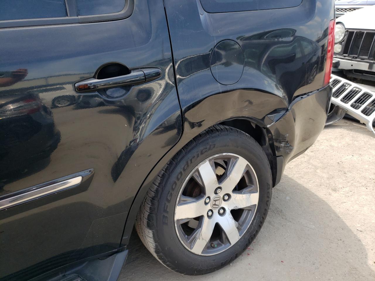 Photo 9 from auction – 2012 HONDA PILOT TOUR with VIN 5FNYF3H94CB007576
