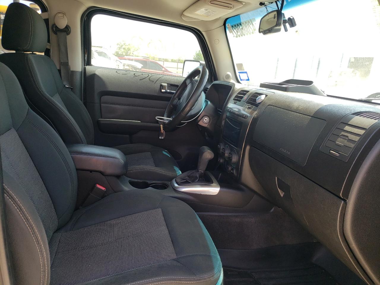 Photo 5 from auction – 2009 HUMMER H3 with VIN 5GTEN13E098100370