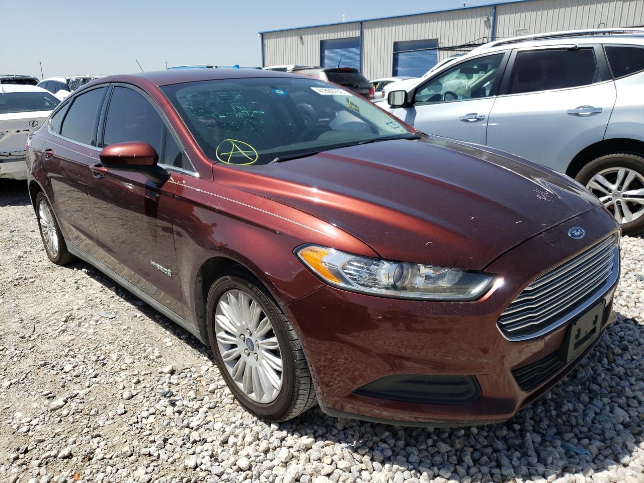 FORD FUSION S H 2015 with VIN 3FA6P0UU2FR198792 - Photo from auction