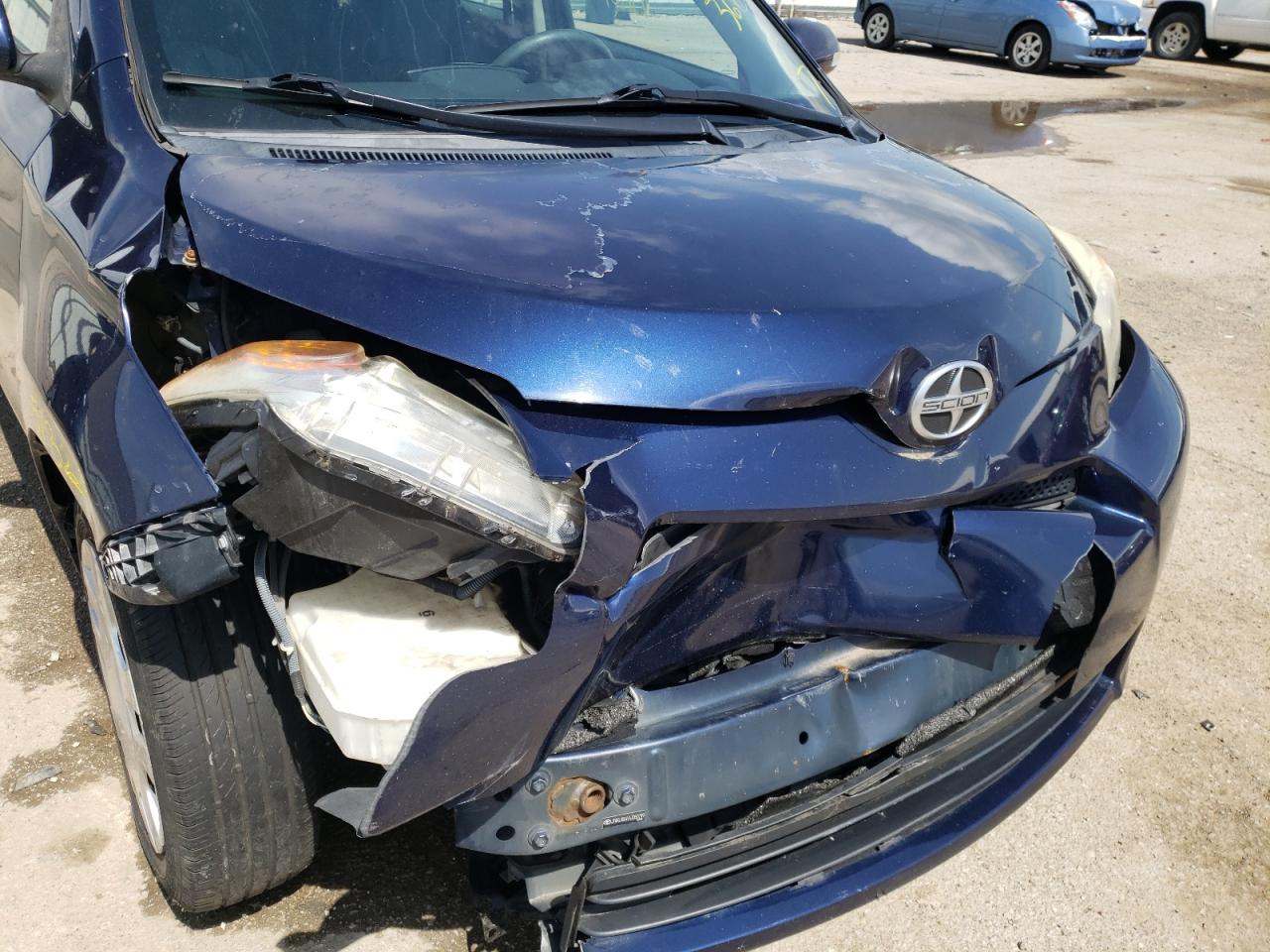 Photo 9 from auction – 2010 TOYOTA SCION XD with VIN JTKKU4B41AJ050799