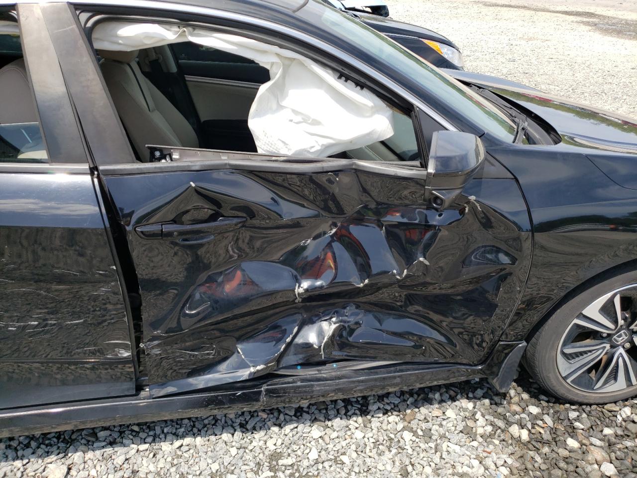 Photo 9 from auction – 2018 HONDA CIVIC EX with VIN JHMFC1F34JX029534
