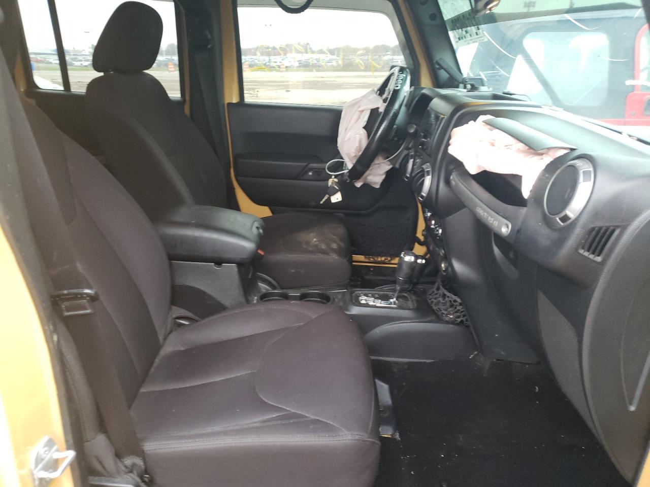 Photo 5 from auction – 2014 JEEP WRANGLER U with VIN 1C4BJWDG6EL205943