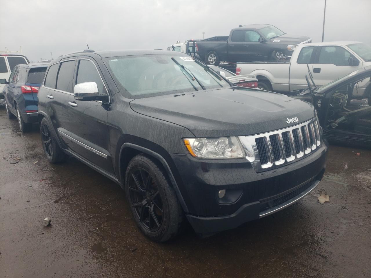 JEEP GRAND CHER 2011 with VIN 1J4RR6GT9BC536134 - Photo from auction