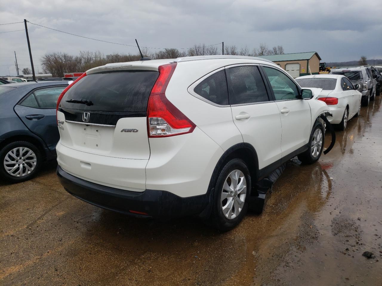 Photo 4 from auction – 2013 HONDA CR-V EXL with VIN 5J6RM4H76DL044197