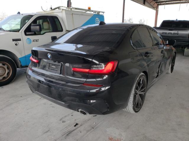 Photo 4 from auction – 2021 BMW 330I with VIN 3MW5R1J03M8C21360