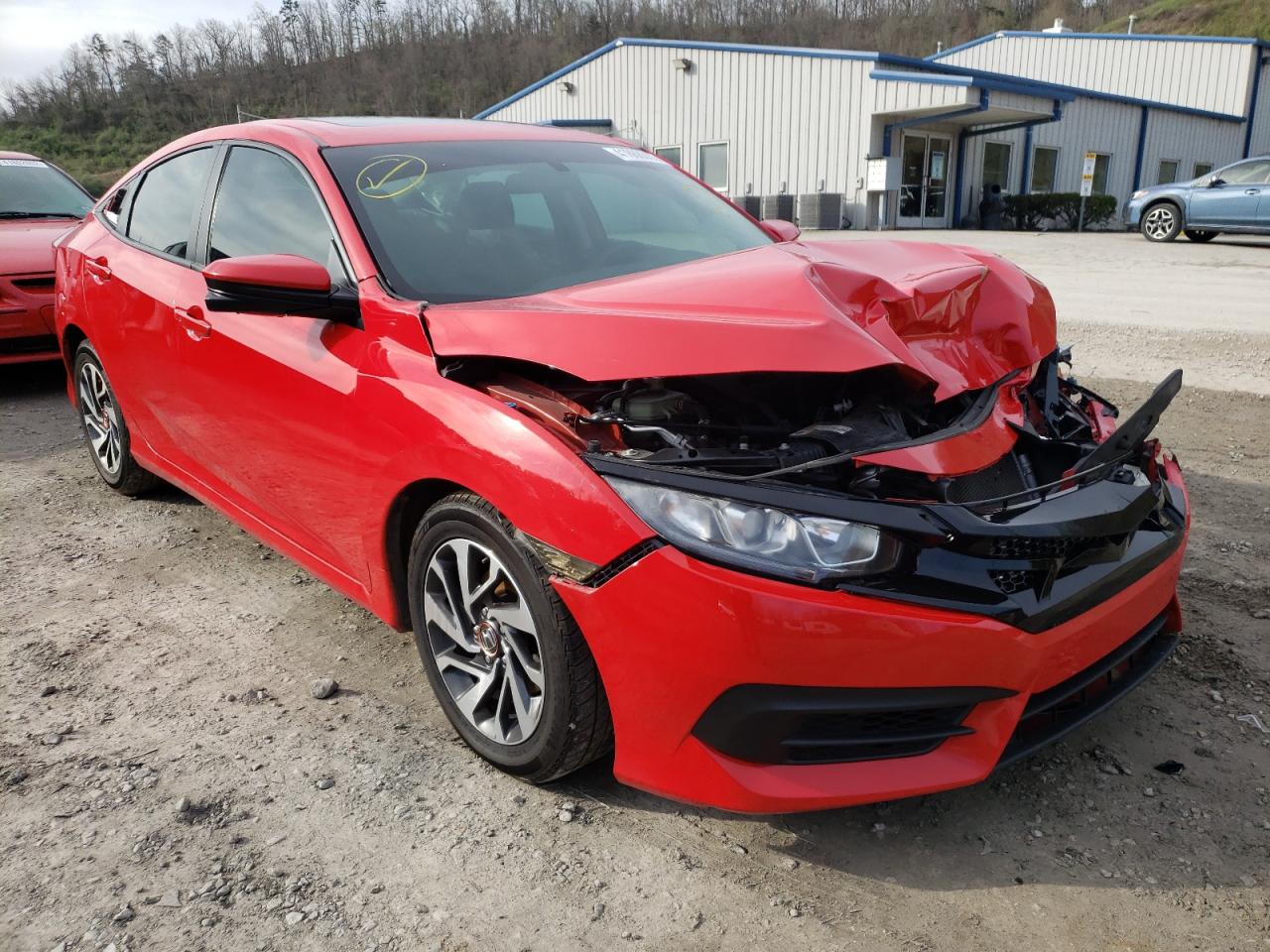 HONDA CIVIC EX 2017 with VIN 2HGFC2F74HH534693 - Photo from auction