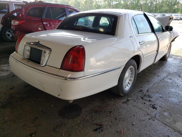 Photo 4 from auction – 2001 LINCOLN TOWN CAR E with VIN 1LNHM81W81Y732738